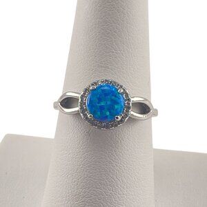 Elegant Blue Opal Halo Ring With Silver Band - Size 8